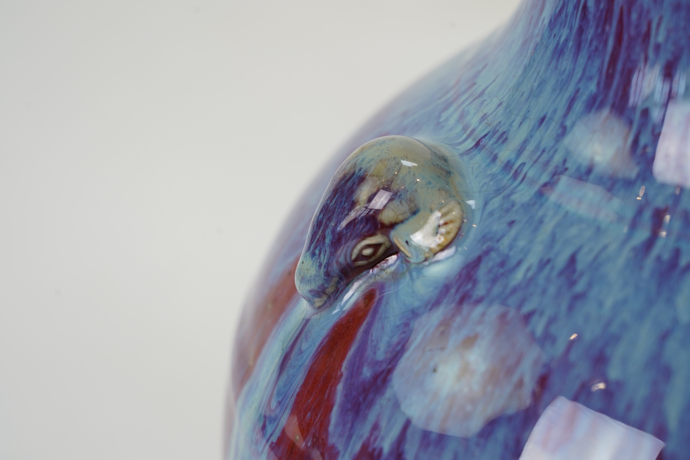 A Chinese flambé glazed ‘three rams’ vase, sanxizun, Qianlong six character seal mark and of the period (1736-95)